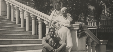 The Kaufmann family on stairs in Italy.