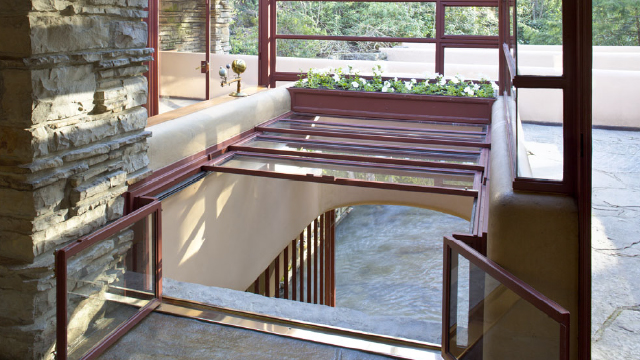 A photo of the hatch at Fallingwater, opened to the stream below