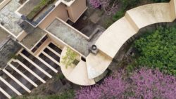 Photo of driveway trellis and guest house steps at Fallingwater by Rick Darke