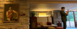 Photo of design resident photographing the Fallingwater living room