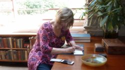Photo of Insight/Onsite participant working at living room desk at Fallingwater