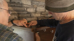 Wood Furniture Removal and Stone Wall Mortar Repair, Wood conservators document the location of hardware 2