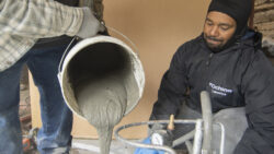 The grout used to fill the voids in the stone walls is created by Masonry Solutions International.