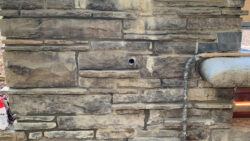 The guest house wall area after repointing, which is a process of removing and replacing deteriorated mortar.