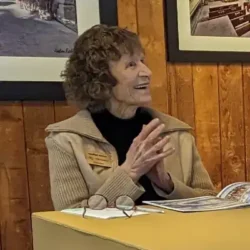Fallingwater volunteer Marilyn Zsiros working in the Speyer Gallery at Fallingwater.