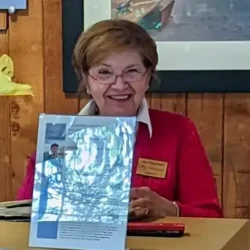 Fallingwater volunteer Pam Seighman working in the Speyer Gallery at Fallingwater.