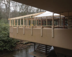 Temporary enclosures are being erected on Fallingwater East Terrace for preservation work.