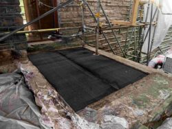 Specialists make significant progress on the mockup and testing on the furnace room roof