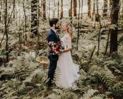 Bride and Groom in the woods near the ampitheatre